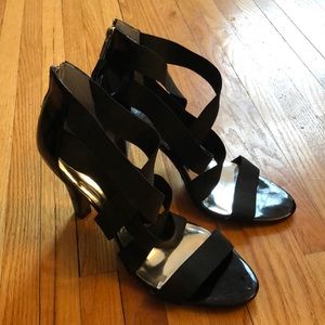 Black patent heeled sandals
